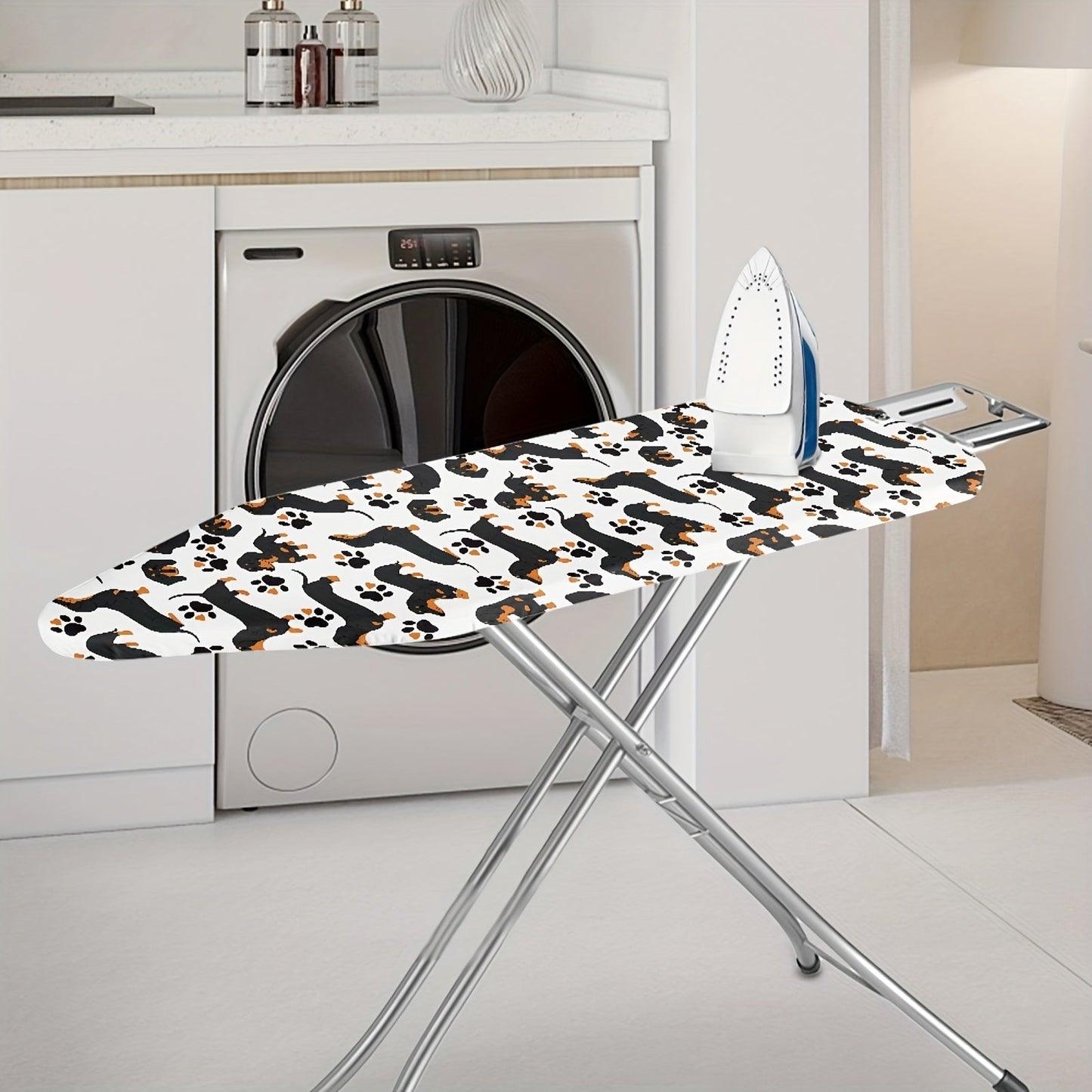 Ironing board dustproof cover with a clear design featuring a dachshund dog pattern. Ideal for replacing old cloth covers on household ironing boards. Perfect for electric iron boards and comes in one piece. Can also serve as a protective accessory for