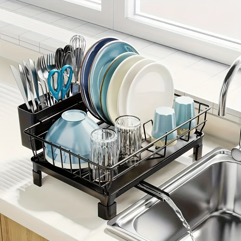 Single layer dish drying rack with utensil holder and drain spout, designed for kitchen countertop and sink. This large capacity dish rack is compact and efficient, perfect for organizing and storing kitchen accessories.