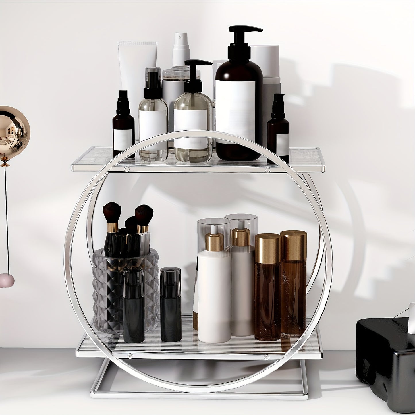 Golden cosmetics storage rack with 2 tiers made of rust-proof cast iron. Large capacity for skincare, lipstick, perfume, and more. Circular design for bathroom and makeup area.