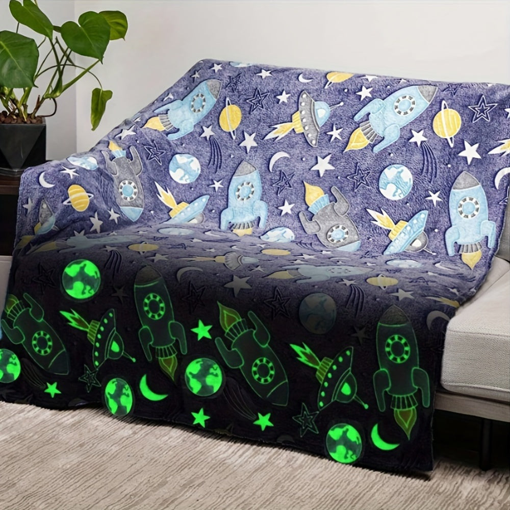 One piece of contemporary style throw blanket featuring glow in the dark space theme. Made of knitted all-season polyester, this bed blanket has active printing with a cartoon rocket and stars pattern. It is soft and can be used as a sofa cover. An ideal