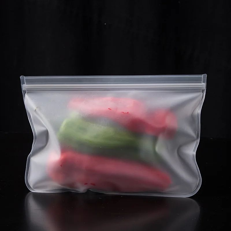 Food safe reusable stand up zip bags made from polyethylene silicone, designed with leak-proof technology for fresh food preservation. The bags feature a rectangular shape and an in-line skate design for easy storage and transportation.