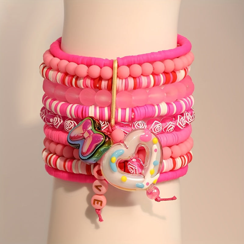 Bohemian-inspired Multi-Layer Pink Resin Beaded Bracelet featuring Heart & Butterfly Charms, a Lovely Pendant Jewelry Piece for Women. Ideal for Valentine's Day, Everyday Wear, or Vacation Style. A Versatile Fashion Accessory for All Seasons.