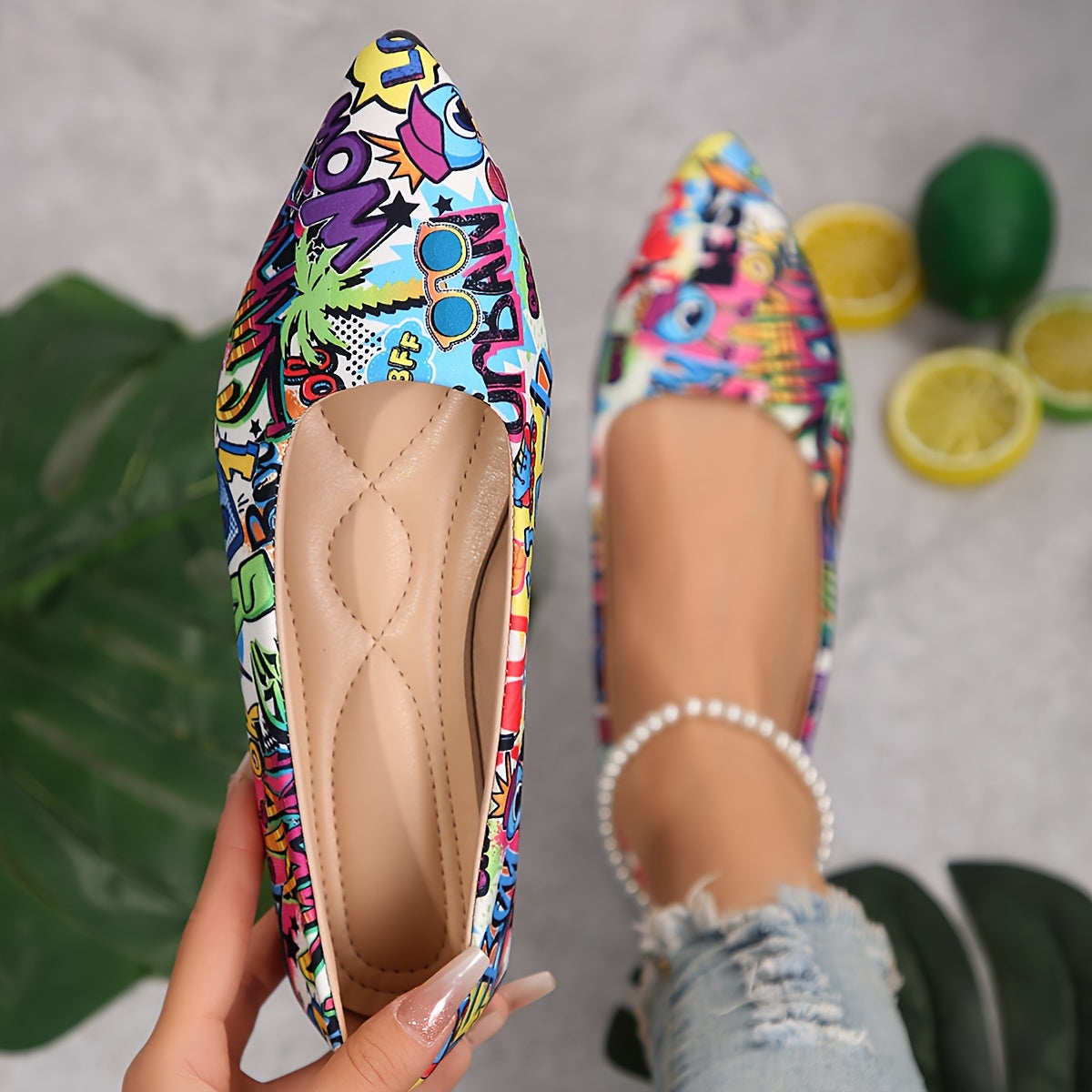 Floral flat shoes with pointed toe and soft sole for daily wear.