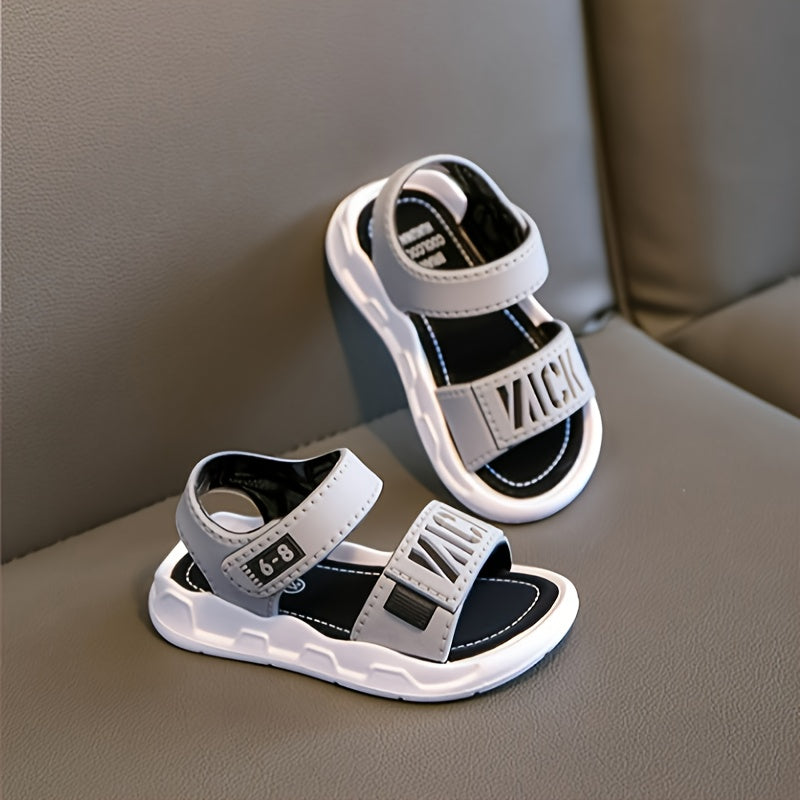 Lightweight, breathable open-toe sandals for boys offer casual comfort in summer.