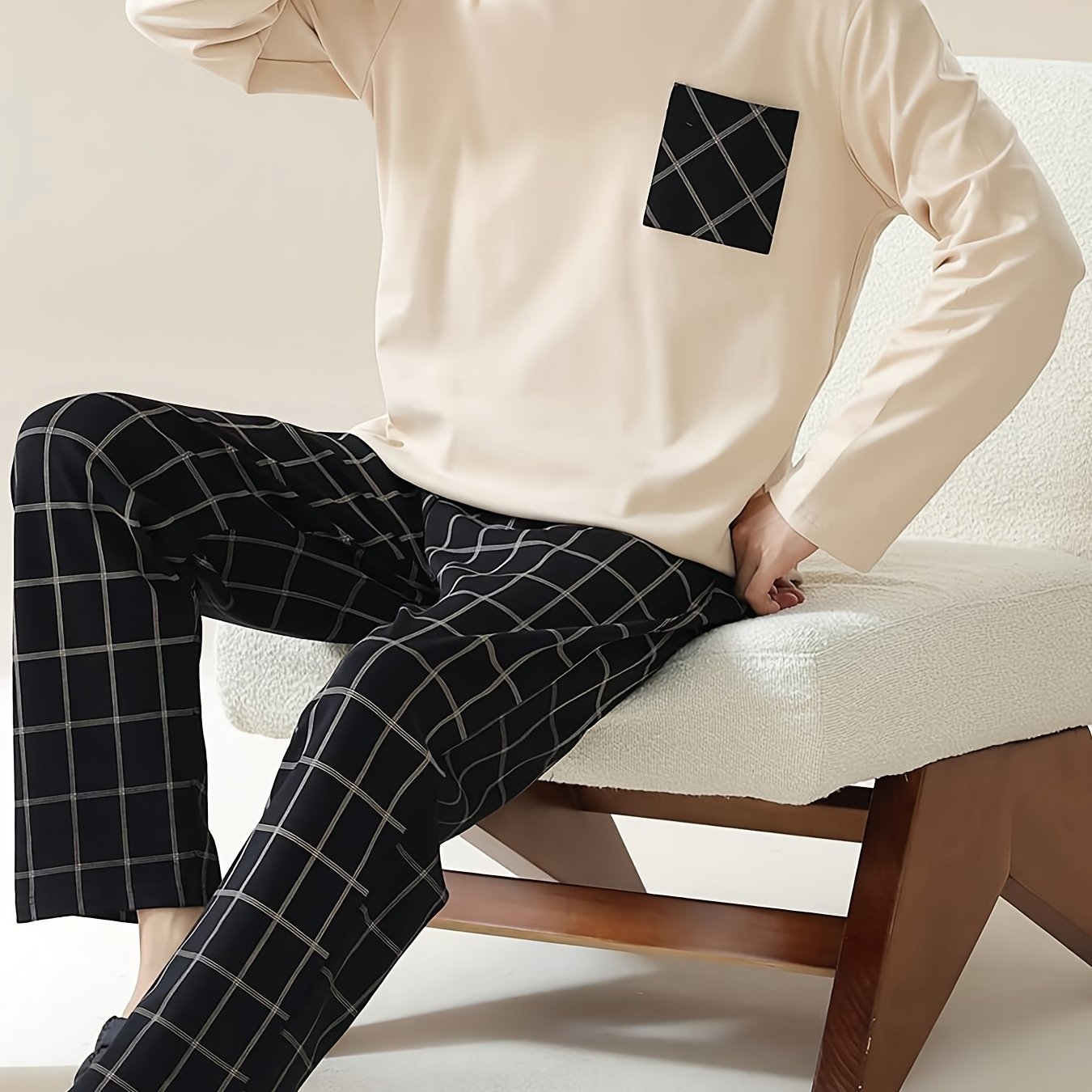 Men's beige long sleeve pullover with pocket, plaid pants in a soft and comfortable sleepwear set. Casual style, regular fit in knit polyester blend fabric - perfect for all seasons.