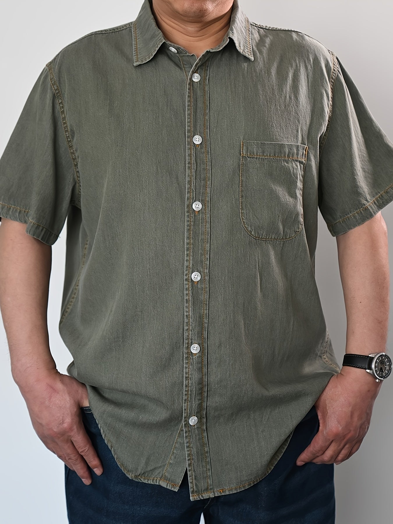 Summer-ready plus size men's denim shirt with vintage flair, V-neck, and button detail. Cotton and lyocell blend, machine washable. Plus size.