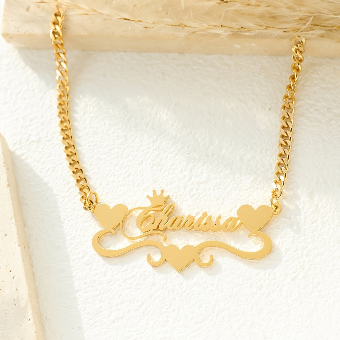 A single elegant custom 4MM Cuban link chain necklace with personalized name pendant, featuring a stainless steel heart ribbon plaque. This fashion crown jewelry for women is a versatile daily accessory suitable for all-season wear.