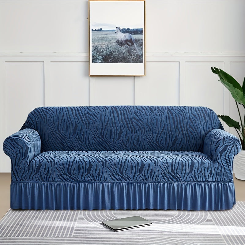 Wave pattern sofa slipcover with skirt, non-slip and dustproof. Protects furniture from cat scratches. Machine washable for easy cleaning. Suitable for bedroom, office, or living room décor.