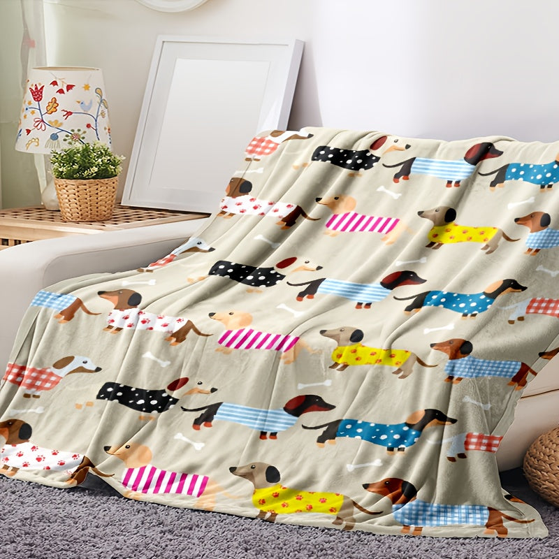 Stay cozy and comfortable with this stylish Dachshund Pattern Throw Blanket. Perfect for all seasons, this contemporary knitted polyester throw is stain-resistant and multipurpose. Featuring a digital print, it makes an ideal gift for dog lovers. Enjoy a