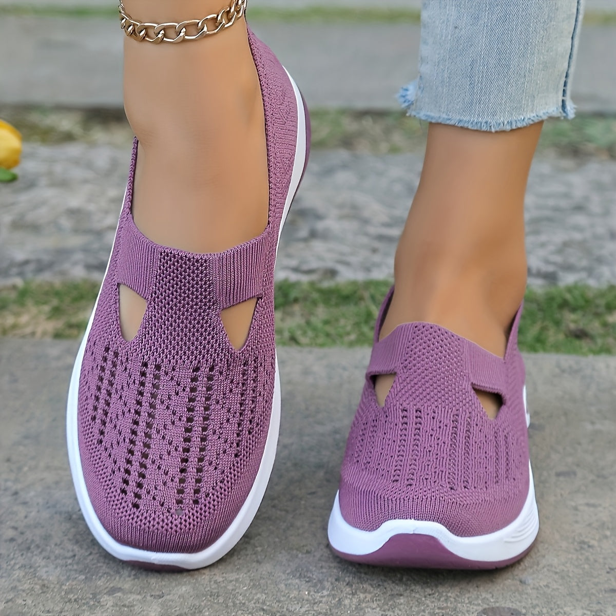 Breathable mesh slip-on sneakers with PVC sole, fabric insole, and lining for stability and comfort. Perfect for casual outdoor wear in spring and summer. Features cut-out patterns and