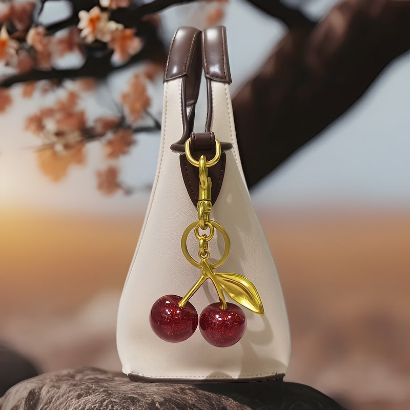 Glistening Cherry Fruit Keychain - Made of Alloy with Resin Pendant, featuring a Food-Inspired Circular Design, Adjustable C-Hook Clasp for Women's Purses & Handbags.