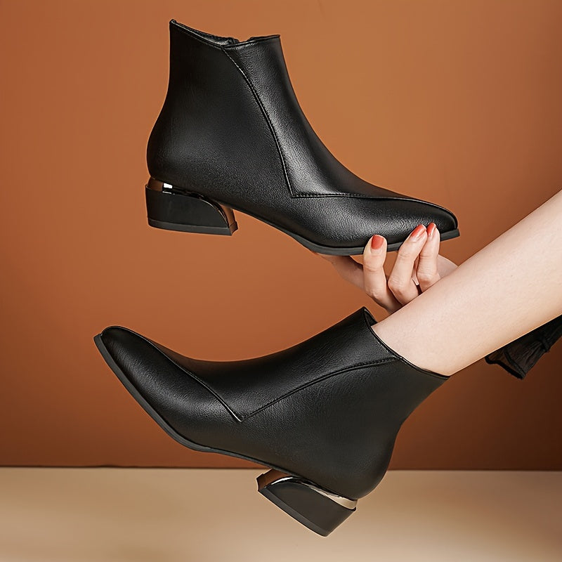 Women's low heeled ankle boots with pointed toe and side zipper, perfect for casual wear.