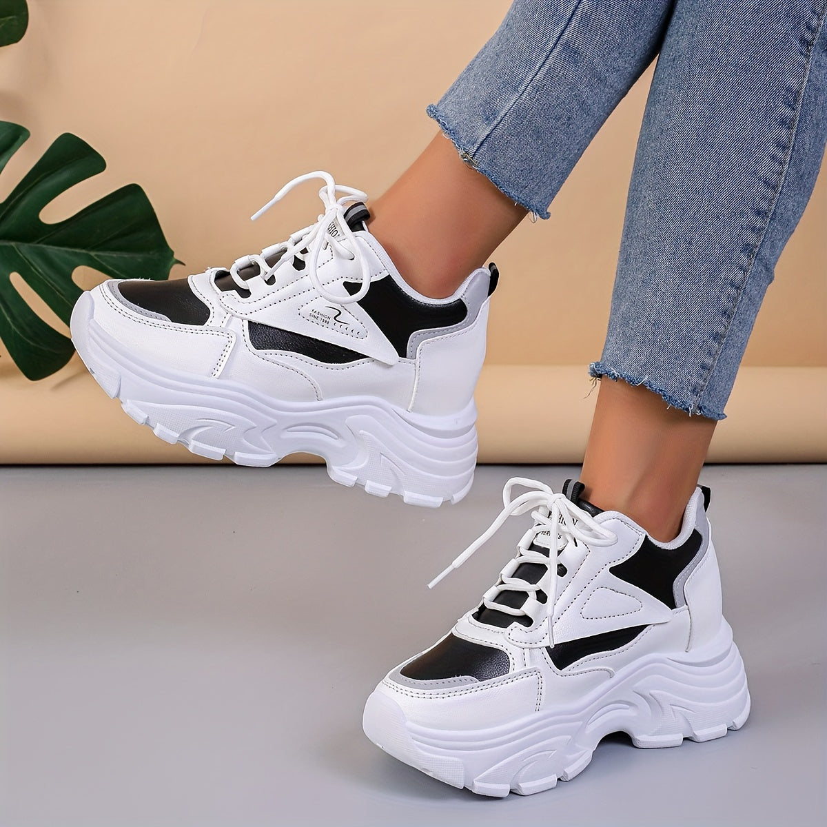 Chunky sneakers for women featuring a casual lace-up design and trendy wedge sports shoes.