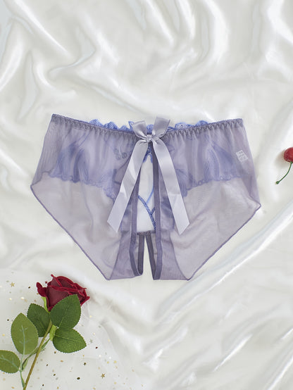 Women's light purple lace mesh panties with floral embroidery feature an open crotch and breathable, sheer design made from a nylon and elastane blend that is hand washable.