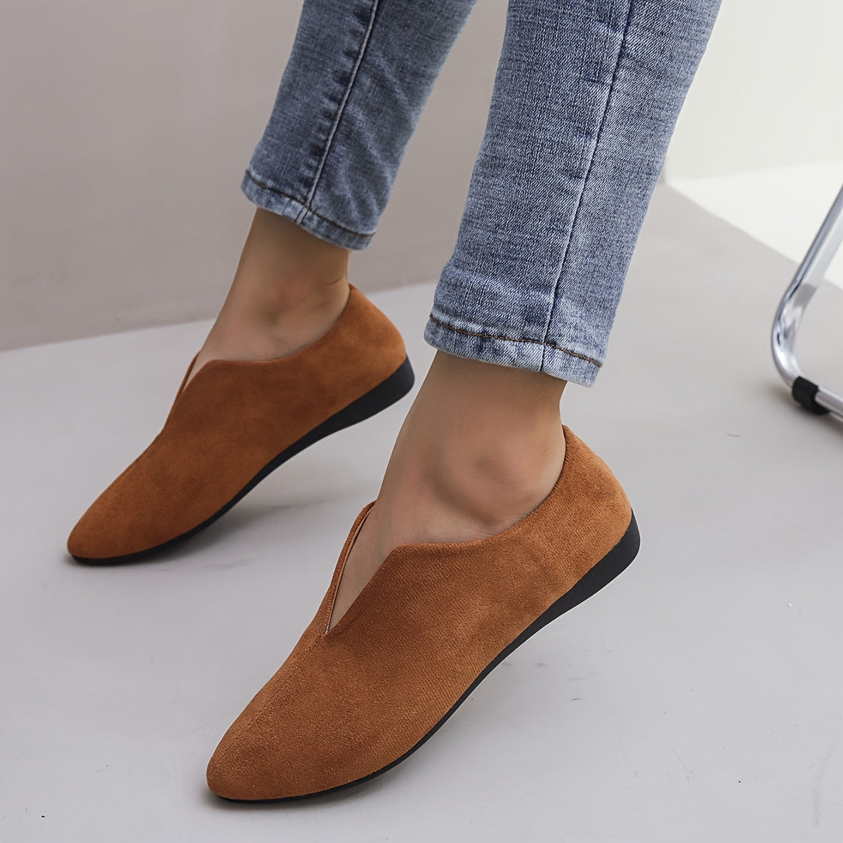 Women's solid color casual flats with a soft sole and point toe.