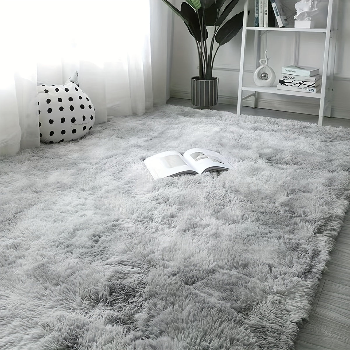 Add some style to your living space with this trendy tie-dye rug. Perfect for lounges, bedrooms, or any other cozy area, this fluffy throw carpet will bring warmth and decoration to your home. Versatile enough to be used in various spaces like living