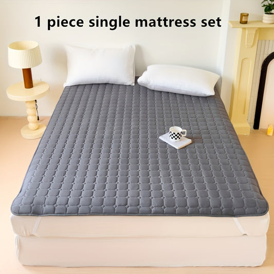 Waterproof mattress topper with machine washable quilted polyester cover, polyurethane liner, and non-slip design for dormitory and home use. 1-piece.