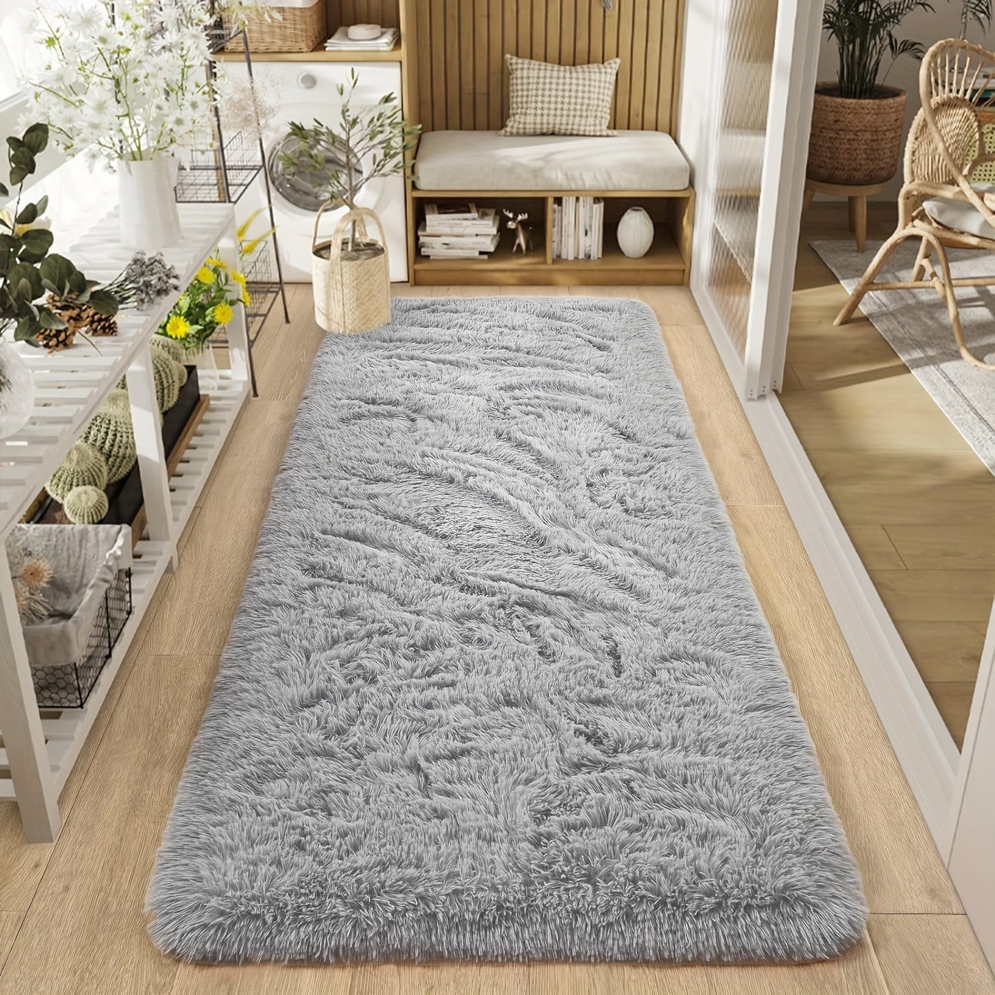 Soft shaggy area mat with a tie-dye design, made with 260g polyester and a 0.6cm thick sponge base. Features a 21 density for added comfort. Machine washable and suitable for indoor use in living rooms, bedrooms, game rooms, and dorms. This Nordic style