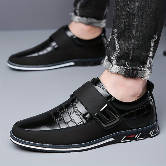 Men's dress loafers with hook and loop fastener for business or casual wear.