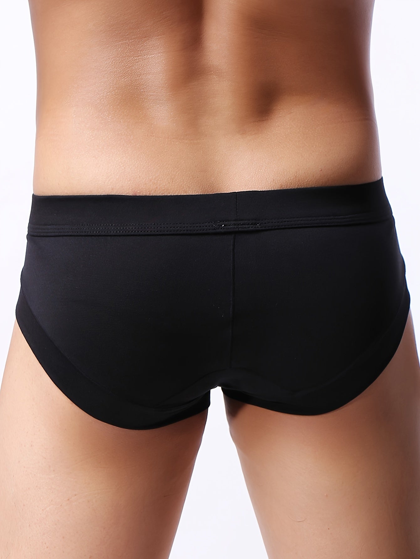 Men's viscose blend briefs with solid color, medium stretch knit fabric, large pouch, comfortable, skin-friendly material, and casual style.