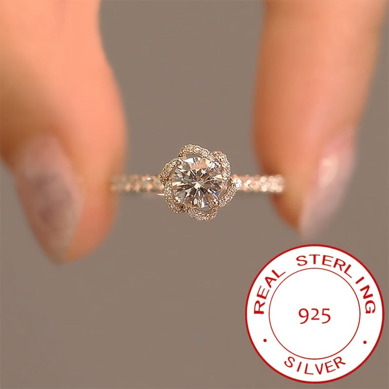 This exquisite jewelry ring, designed for women, is crafted from 925 sterling silver and adorned with dazzling zirconia stones. It is a beautiful symbol of love, weighing around 2.7 grams, making it a perfect gift for someone special in your life.