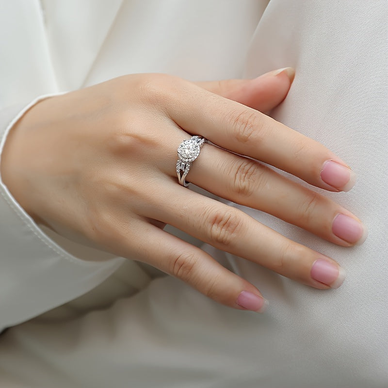 925 Sterling Silver Promise Ring featuring a 1ct Moissanite stone with an 18k Gold Plated Classy Halo Design. This High Quality Engagement or Wedding Ring comes with a Certificate of Authenticity and a Gift Box included.