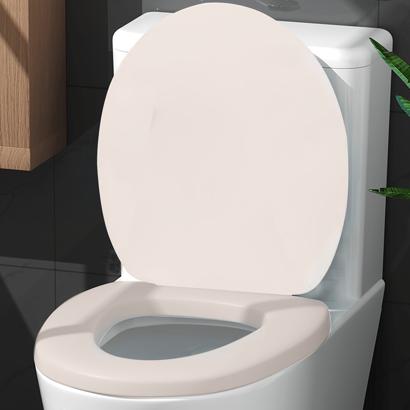 Soft and durable toilet seat cover with quick release, secure fit, anti-slip, and easy to clean, suitable for standard toilets in both home and commercial settings.