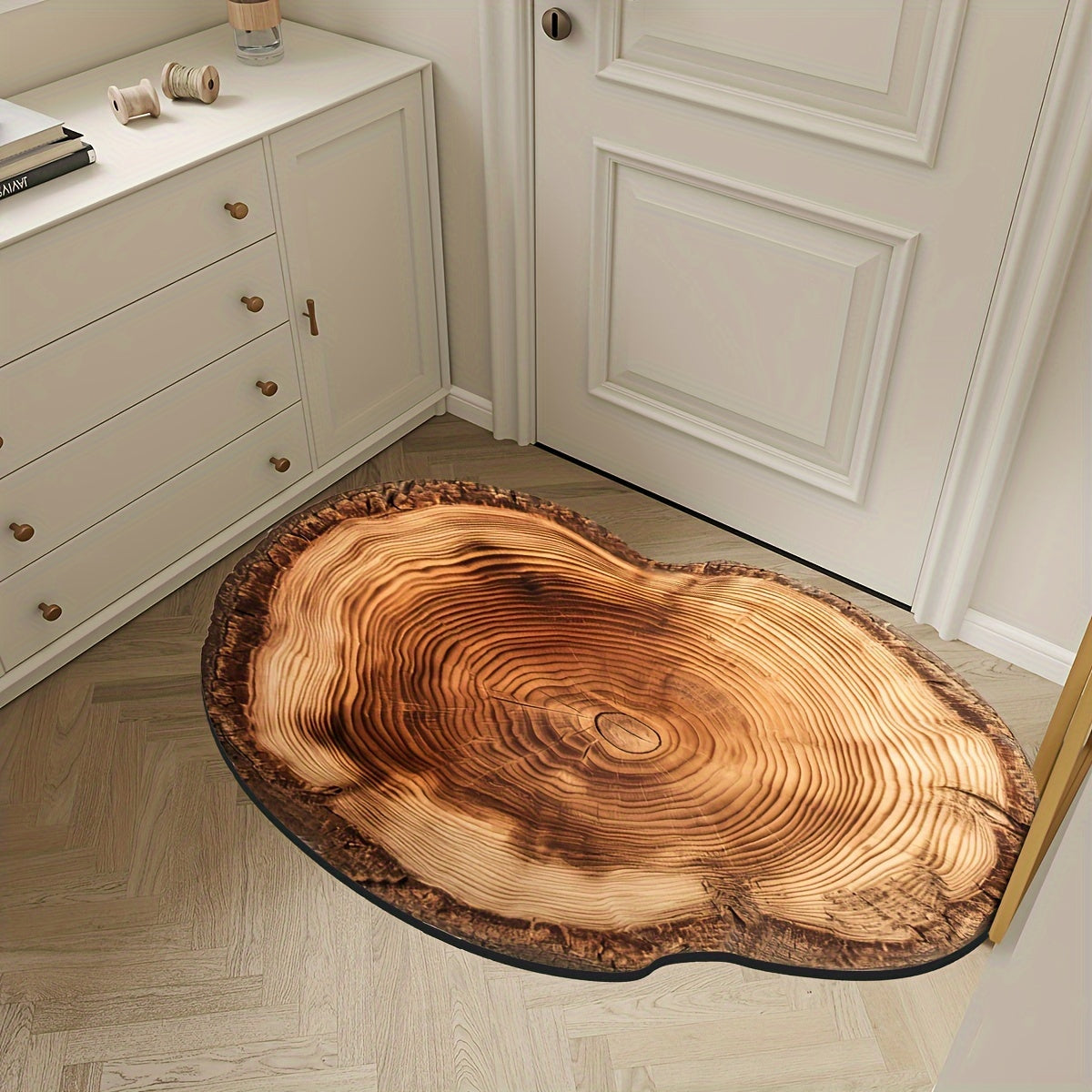 Wood Grain Tree Ring Design Indoor Doormat featuring a non-slip rubber backing for added safety. This decorative floor mat is made from machine-made polyester and is hand-washable. The low pile entry rug is flame resistant, making it perfect for use in