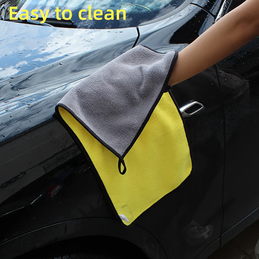 A set of premium ultra-fine microfiber car cleaning cloths that are extremely absorbent for washing, drying, and cleaning tasks in various settings like home, kitchen, bathroom, windows, and automotive maintenance. Perfect versatile cleaning tools for