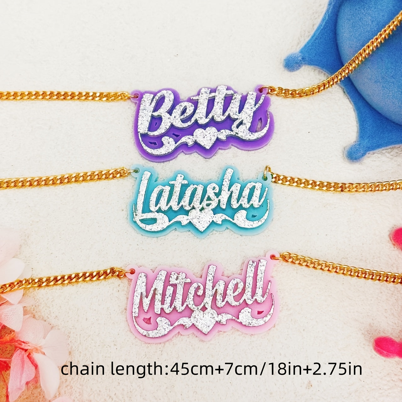 Personalize your style with a custom sparkling acrylic name necklace, adorned with a heart-shaped lace and personalized English nameplate. Available in a variety of colors, this classic piece is perfect for women looking to add a unique touch to their