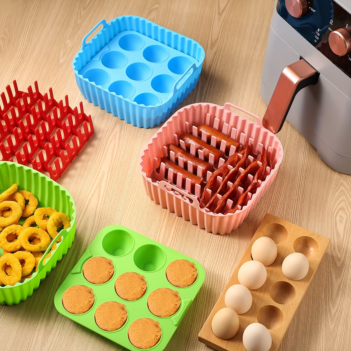 Premium Square Air Fryer Silicone Set includes a bacon & hot dog rack, 9-cavity cake mold, and air fryer pan. This BPA-free and dishwasher safe set is compatible with 7QT+ air fryers.