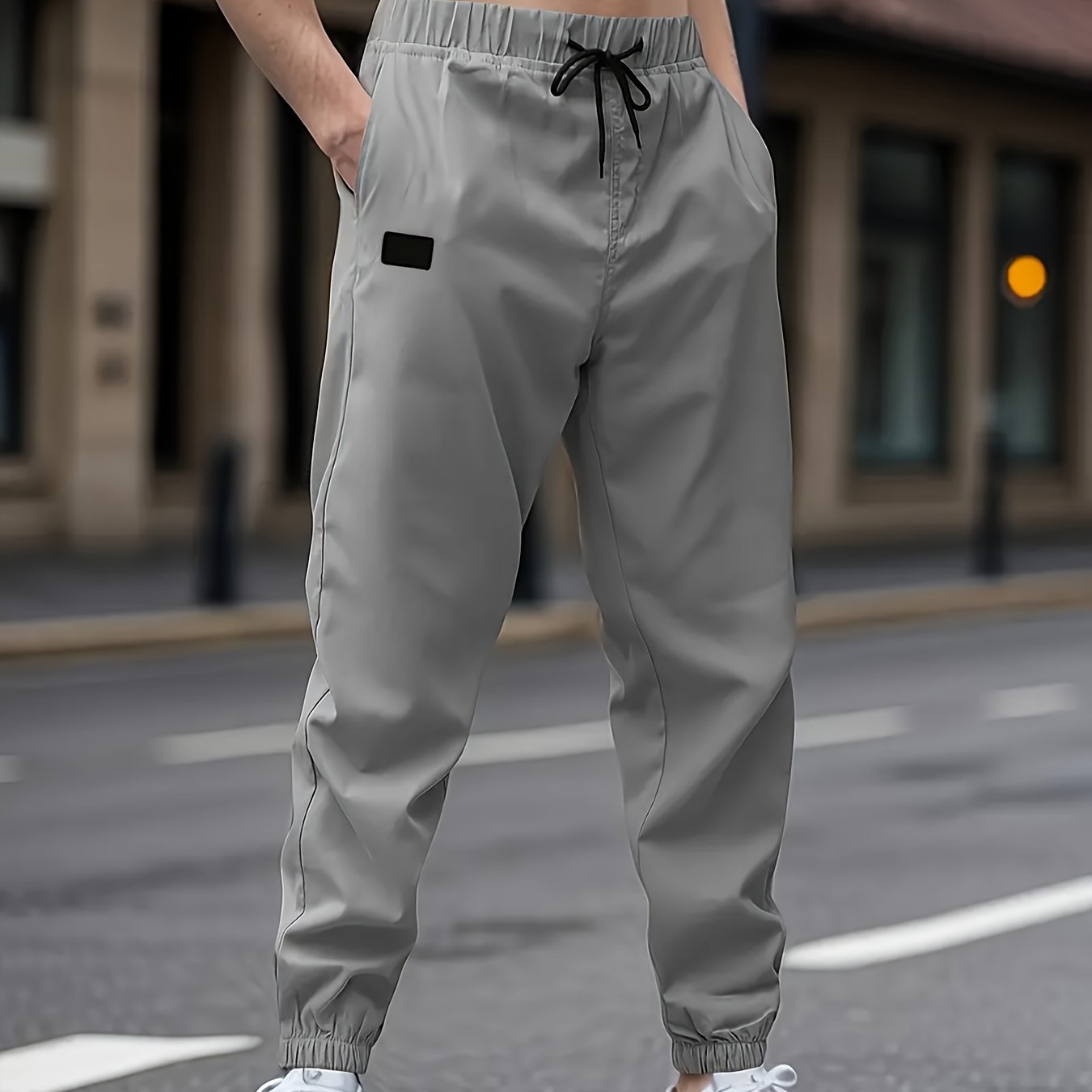 Men's casual cargo pants with drawstring waist, non-stretch polyester fabric, regular fit, lined with polyester, ideal for weekend wear.