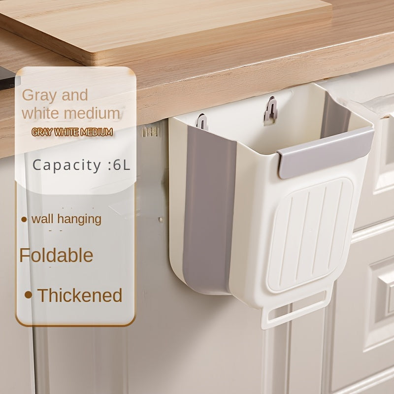 Thickened, foldable kitchen trash can hangs inside cabinet for storage without bending.