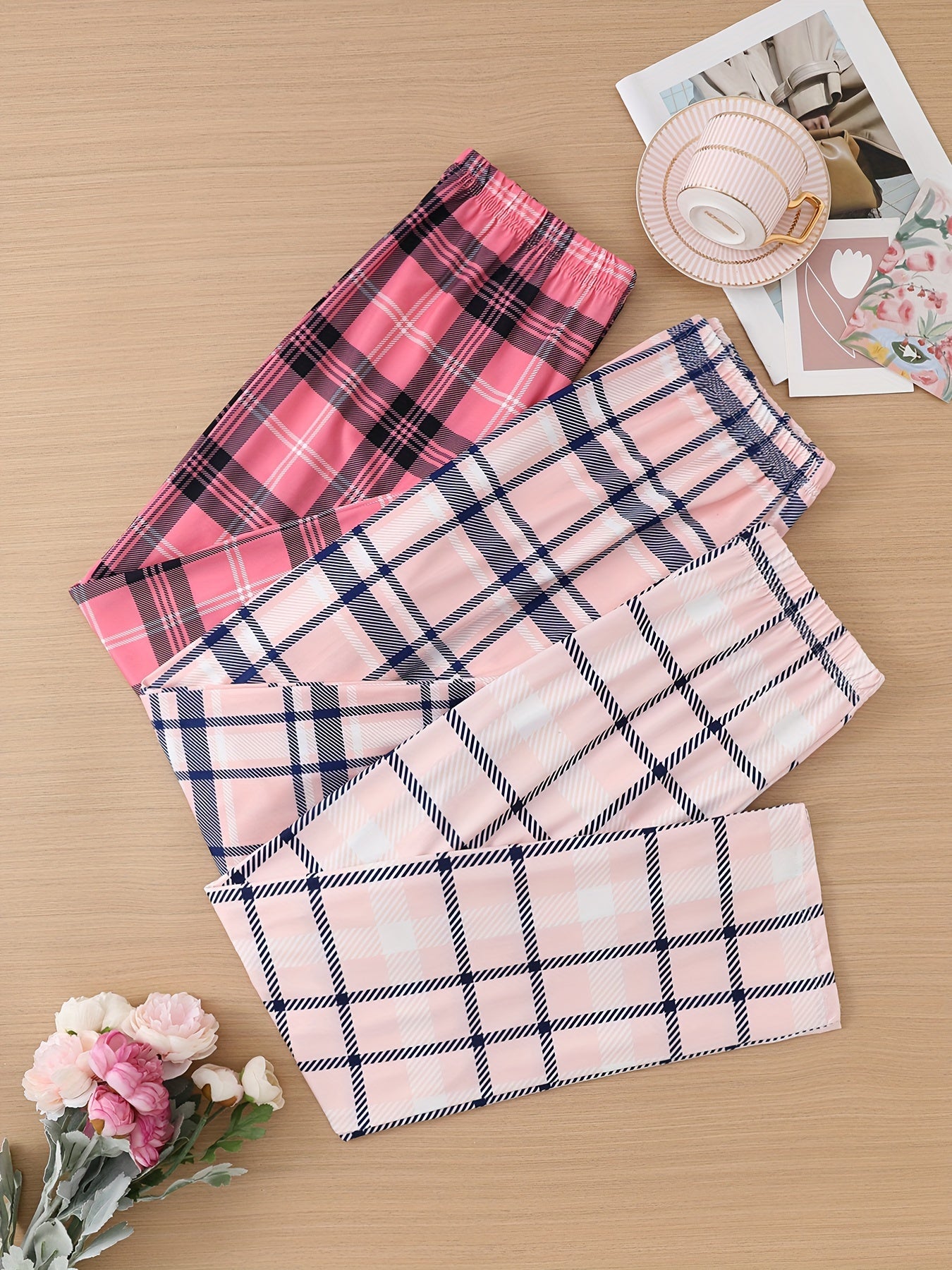 3 Casual lounge pants with plaid print, elastic high waist, and loose fit for women's sleepwear and loungewear.