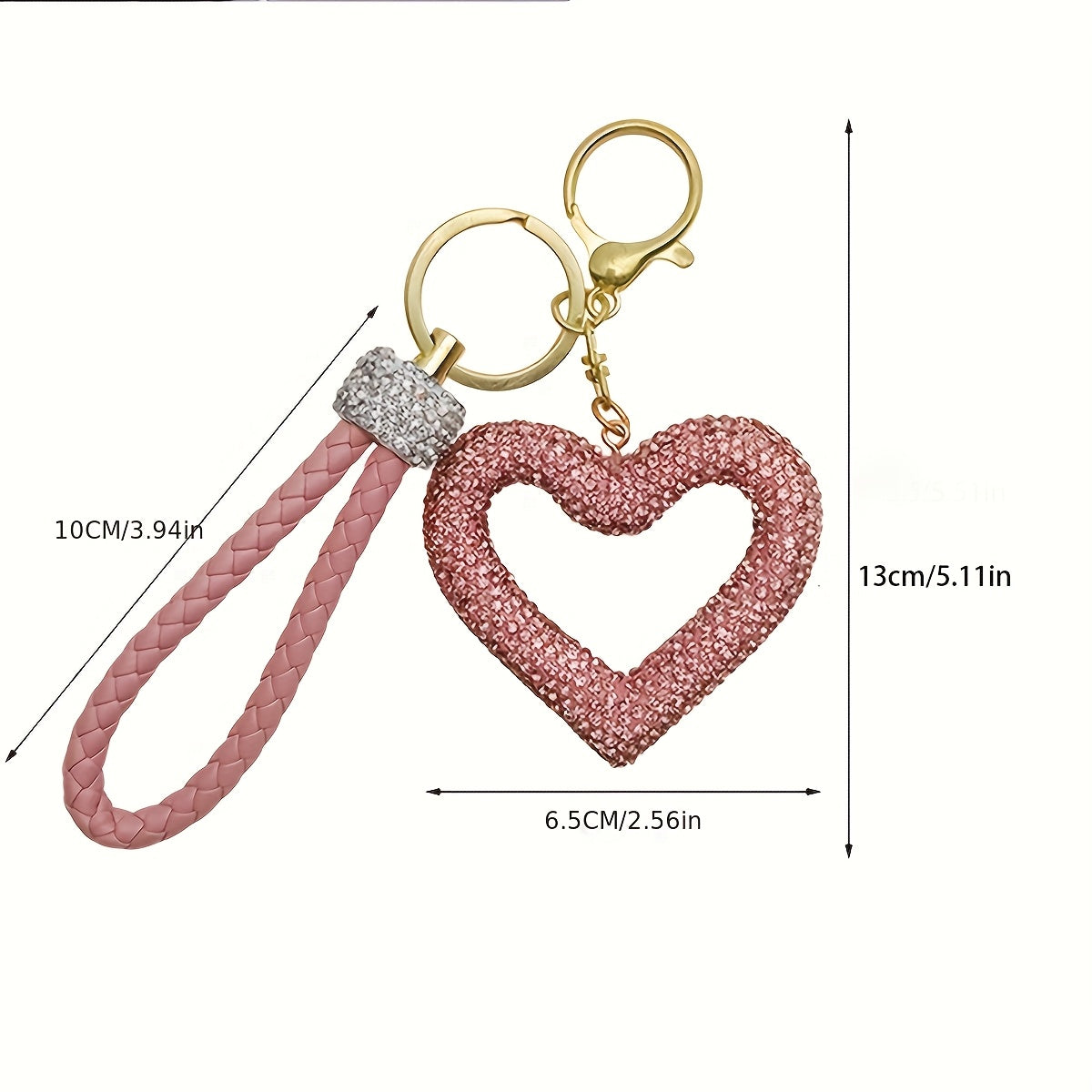 Heart-shaped resin keychain adorned with sparkling rhinestones, featuring a fun cartoon design for a touch of whimsy. Complete with a lobster clasp for easy attachment, this unique keyring is perfect for adding a festive touch to your holiday decor.