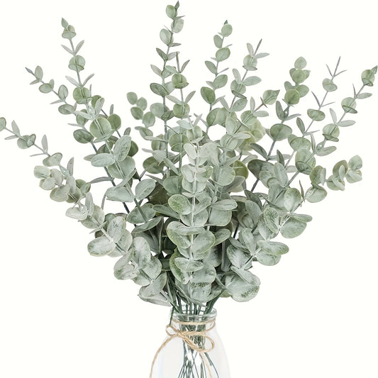 12 dark green faux eucalyptus leaves coated in powder, resembling money leaves. Ideal for floral arrangements, indoor greenery for weddings, parties, outdoor gardens, desk decor, and garlands.