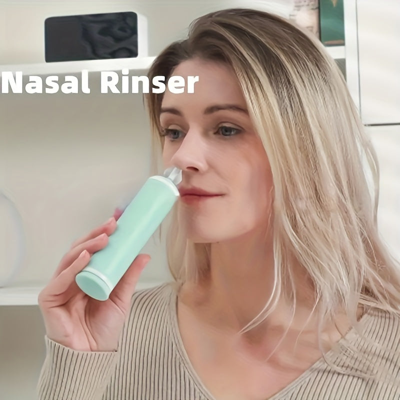 Portable nasal cleaner for both adults and children, manual irrigation system for home use, travel-friendly with no need for electricity or batteries.