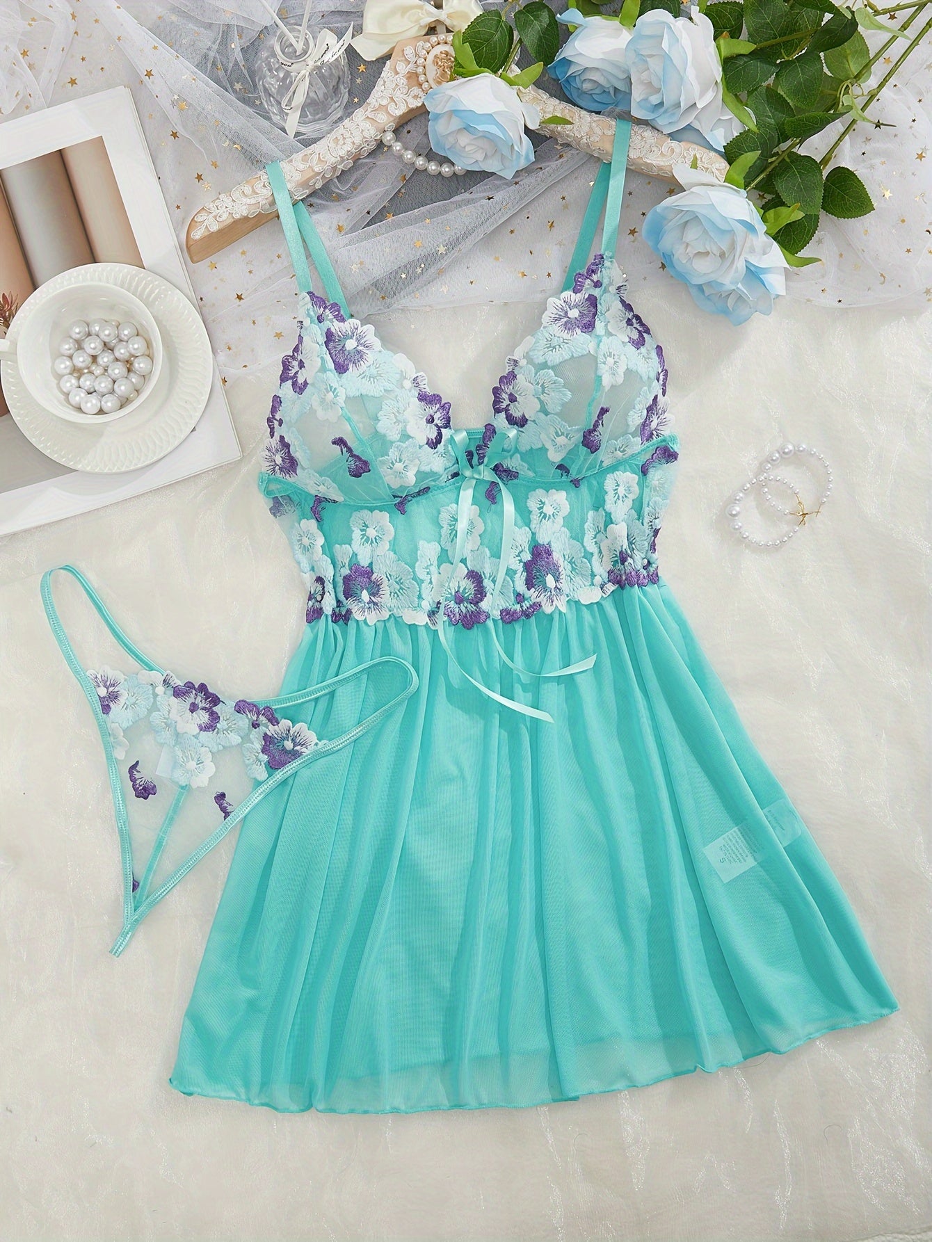 Women's sexy clothing set includes embroidered flower pattern babydoll, deep V slip dress, and thong.