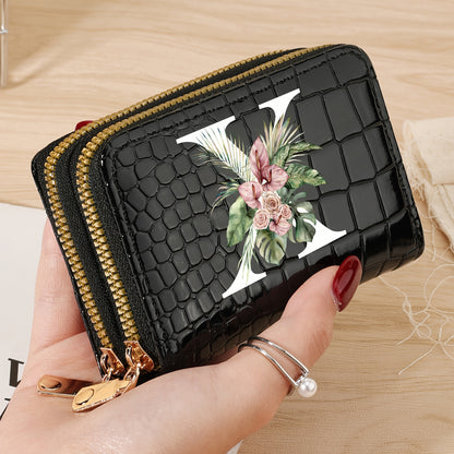 Women's credit card wallet with elegant floral letter print in black & white. Features large capacity, dual zipper, crocodile texture PU, lightweight design with nylon lining for everyday