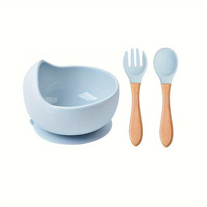 Three pieces of silicone feeding bowl, fork, and spoon set with durable suction bowl. Includes feeding kit with wooden handle, non-slip design, and microwave safe.