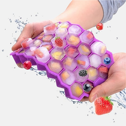 The Silicone Honeycomb Ice Tray is designed with 37 compartments and a lid for easy storage. Made of durable silicone, this tray is perfect for creating hexagonal ice cubes and can also be used for making chocolate, wax bottles, and candy. The flexible