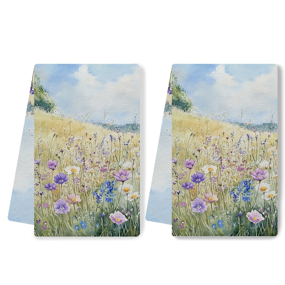 Two pieces of ultra soft kitchen towels with a vibrant wildflower meadow design. These highly absorbent and machine washable dish hand towels are perfect for contemporary coastal decor. Each towel measures 40.64x60.96 cm. Ideal for use as dish towels.