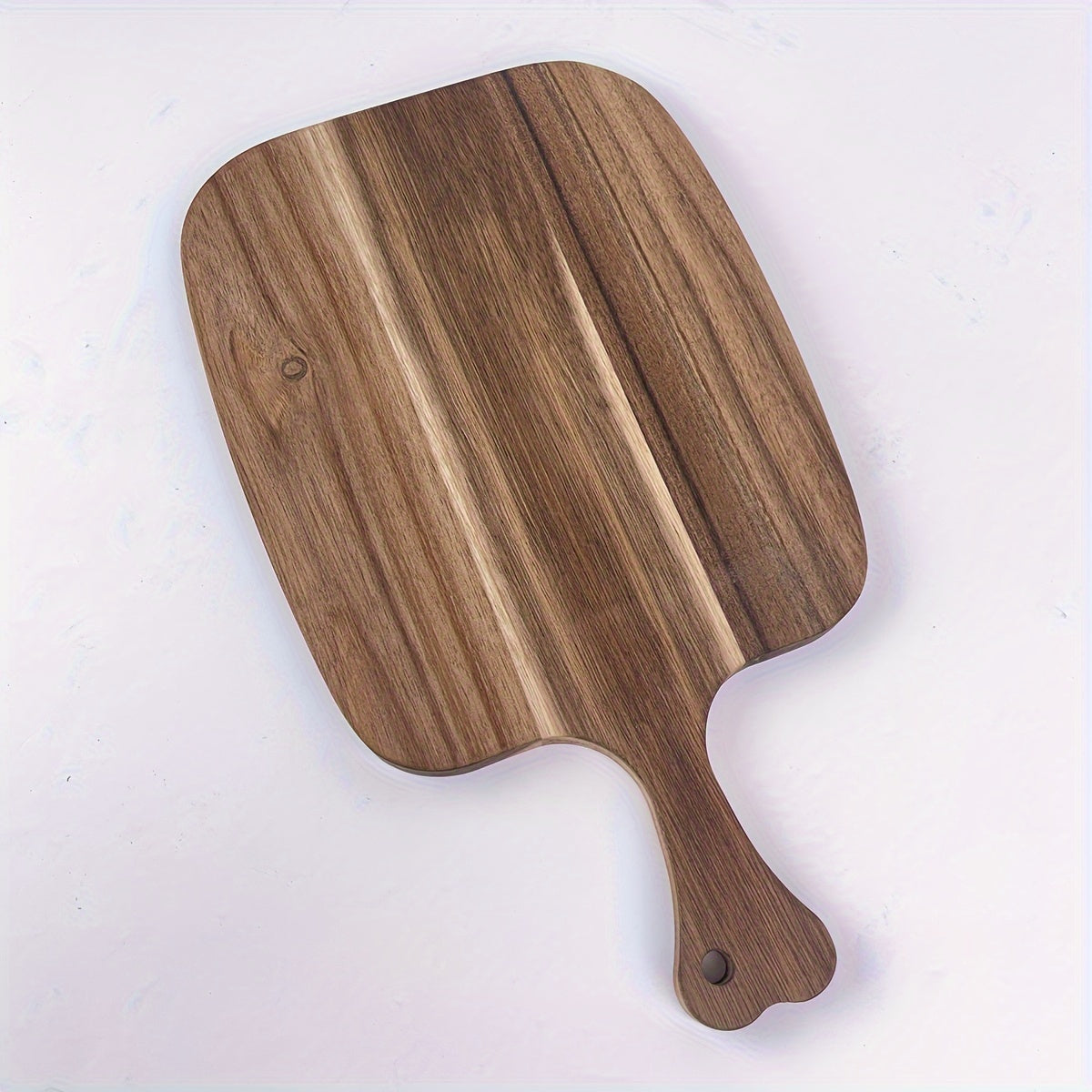 Multi-functional wood cutting board, perfect for chopping cheese, meat, bread, vegetables, and fruits. Features an extra thick design with a handle for easy transport. Durable and easy to clean, ideal for use in homes or dormitories.