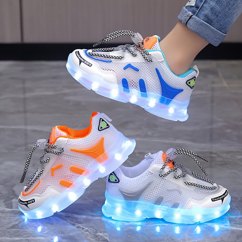 Children's LED light-up sneakers with breathable mesh, non-slip soft sole, and trendy street style for nighttime visibility, ideal for outdoor play and sports in white/blue/orange designs.