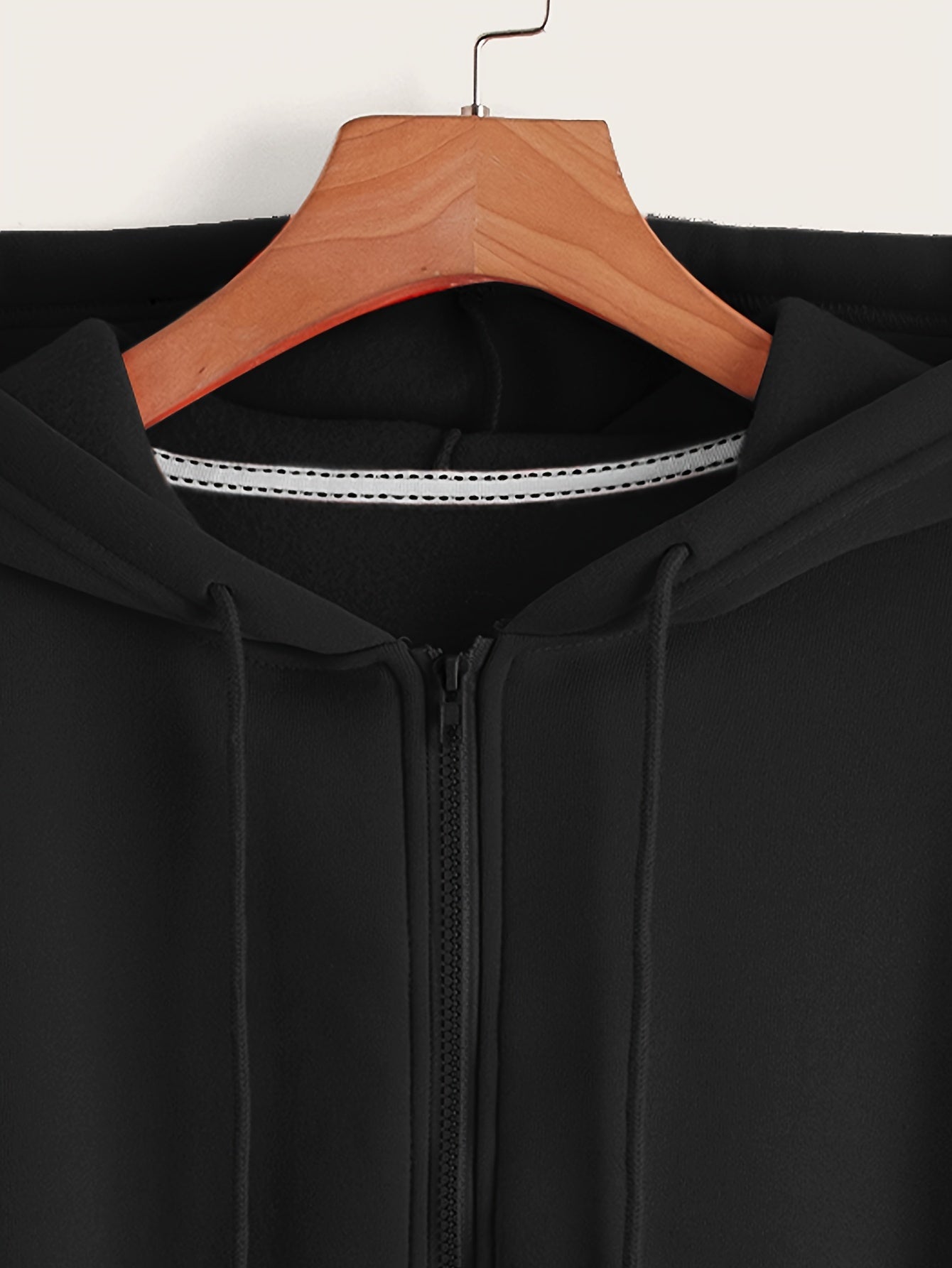 Spring and fall women's cropped drawstring hoodie with long sleeves.