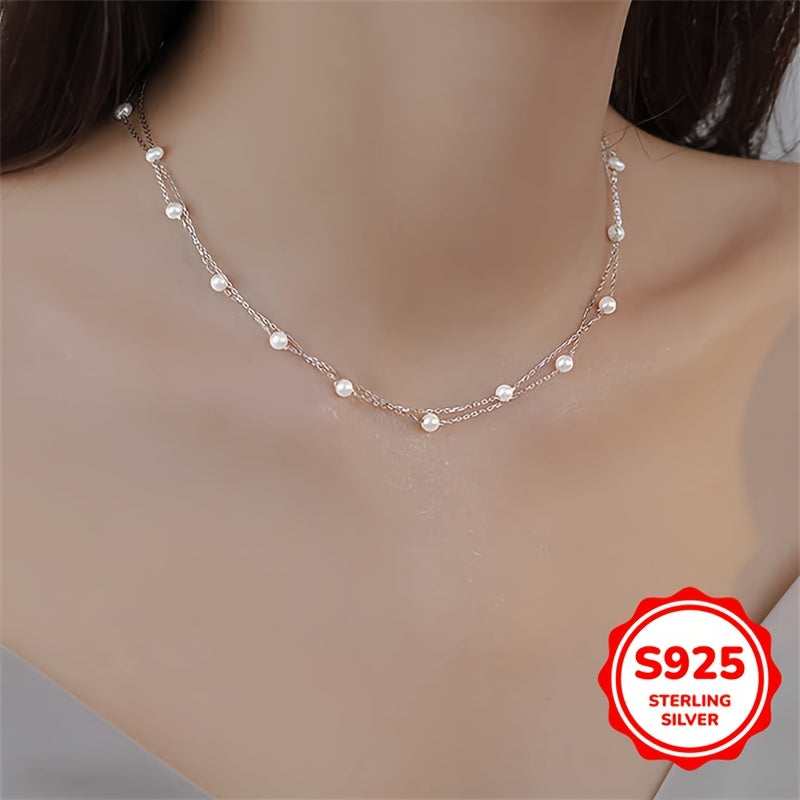 This double-layer pearl necklace is made of 3.02g of S925 sterling silver, giving it a simple and elegant look. The light luxury and high-end design make it perfect for women to wear as a clavicle chain. It is an ideal gift for birthdays, Mother's Day