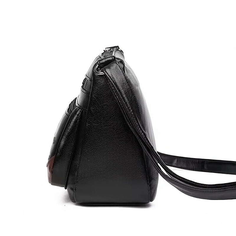 New crossbody shoulder bag with multiple layers and random zipper direction.