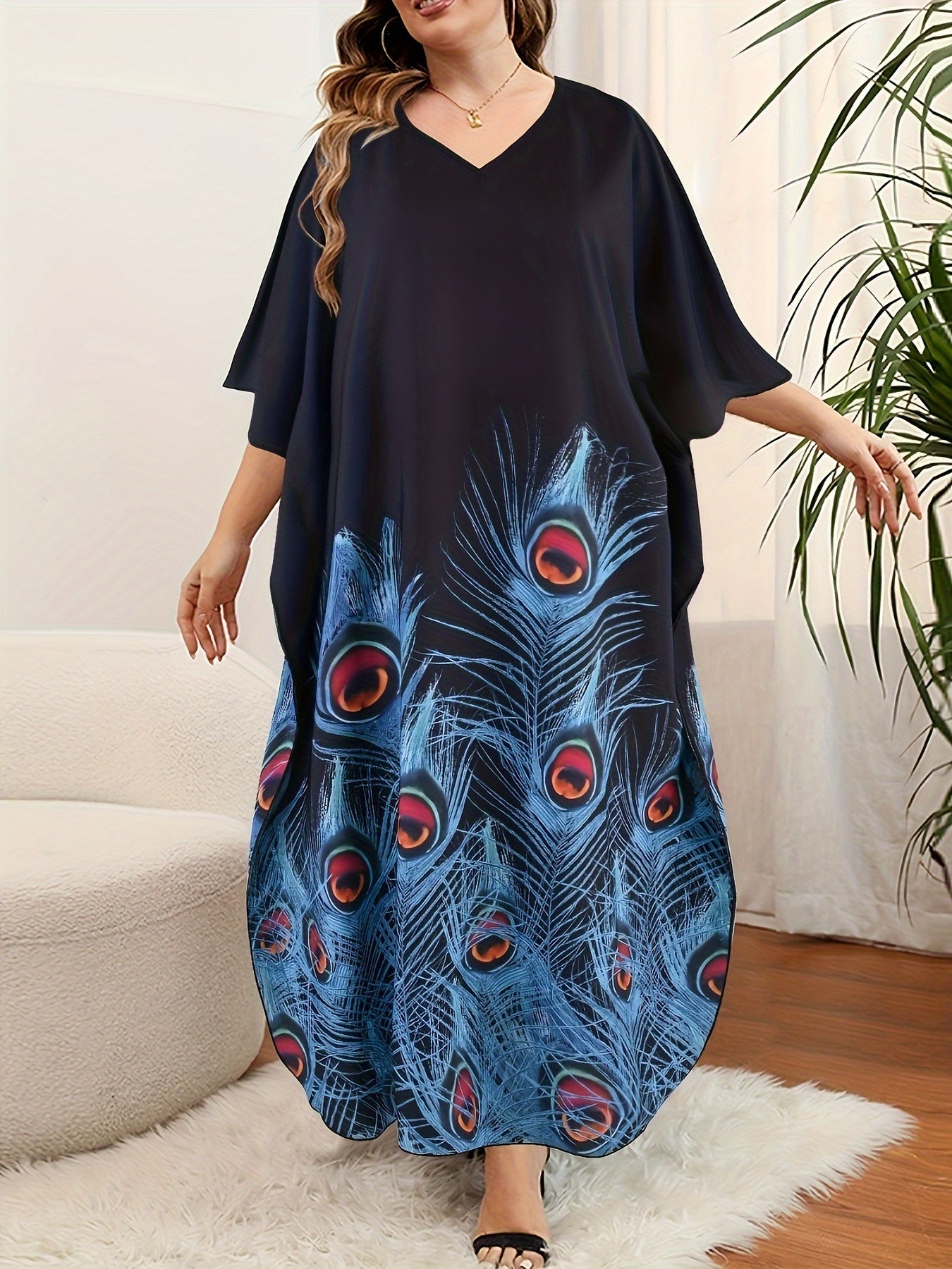 Plus size kaftan dress for women with V-neck print and short batwing sleeves. Loose fit with long length, slit, and made from polyester and elastane. Ideal for spring, summer, and fall