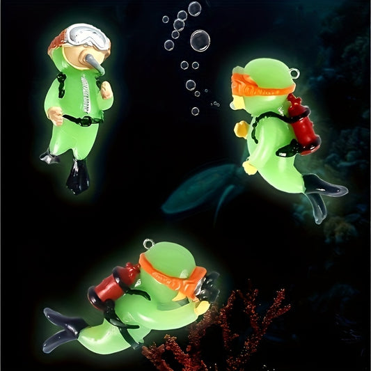 Glow-in-the-dark diver ornament for fish tank decor with fluorescent colors. Great for enhancing aquatic scenery.