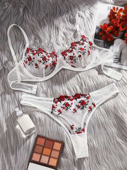 Stylish floral embroidered lingerie set for women made from polyester knit fabric. Features a breathable mesh bra and drop waist briefs with medium support. Comes in ditsy pattern and